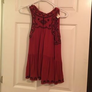 Cute top with front and back slits.