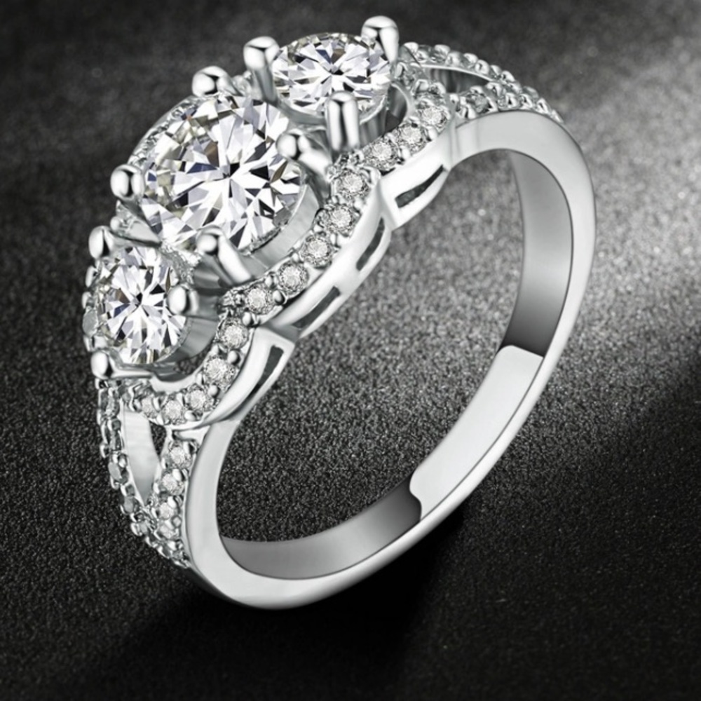 White gold engagement ring very beautiful. CZ