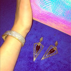Pair of gorgeous earrings and rhinestone bracelet.