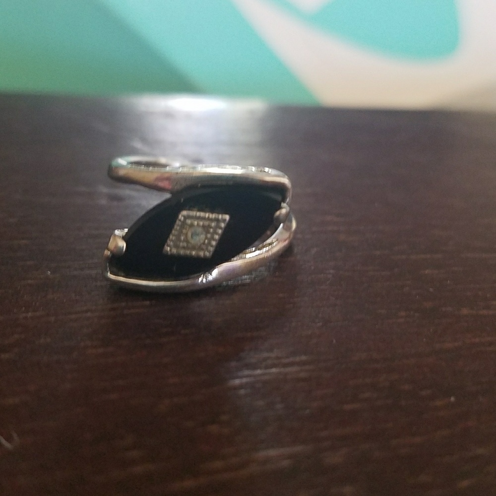 Onyx and diagonal ring