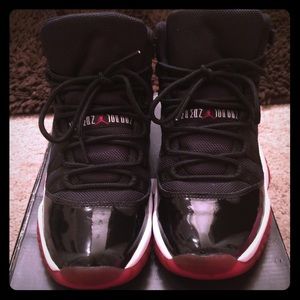 Bred 11s Air Jordan (big kids)