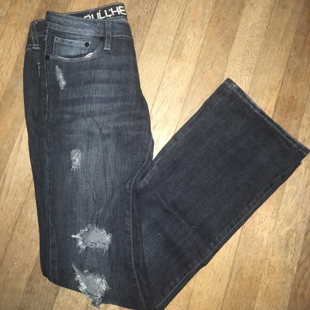 Boot cut distressed jeans