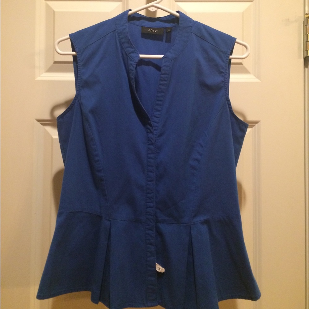 Royal blue sleeveless blouse.