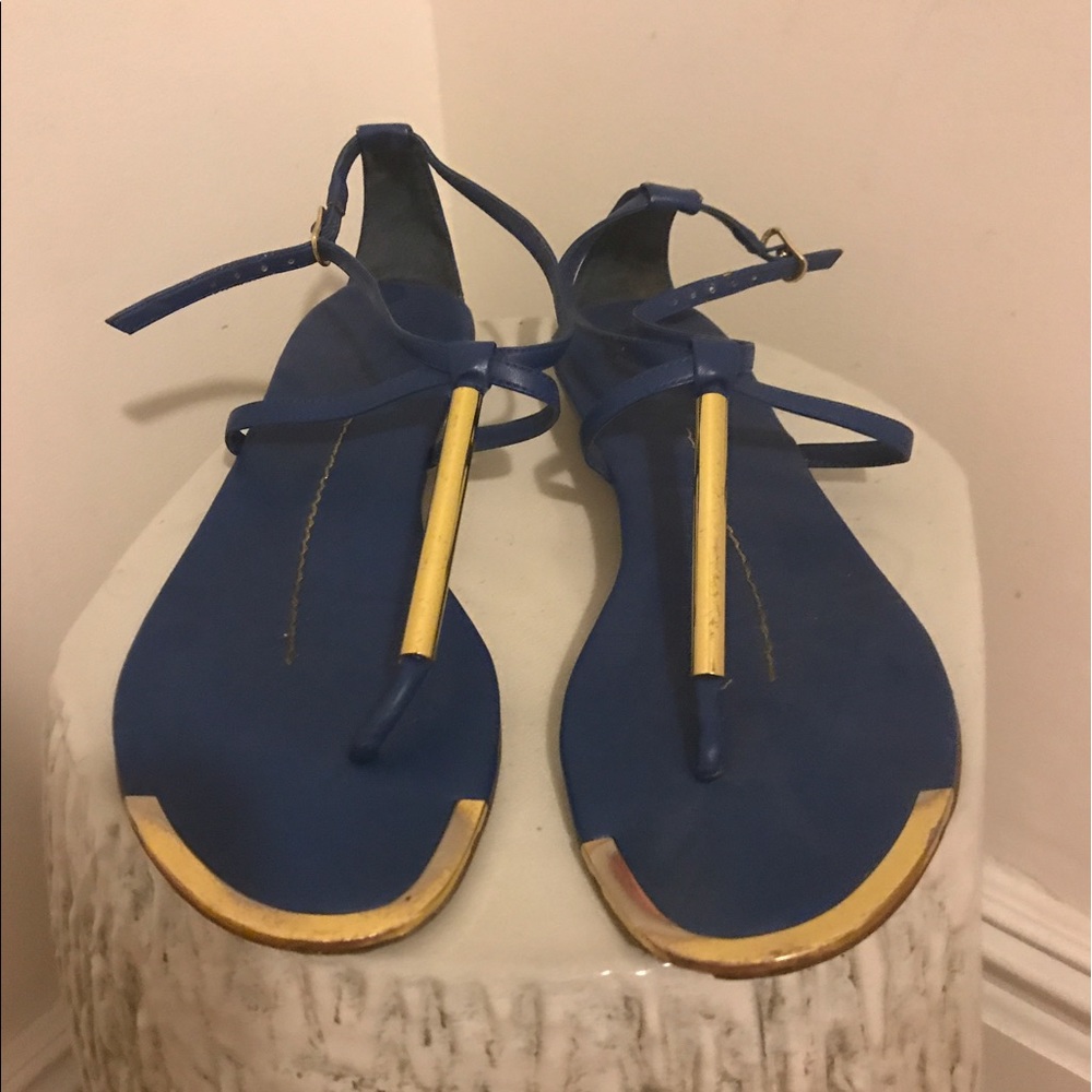 Dolce Vita sandals with metallic accents.