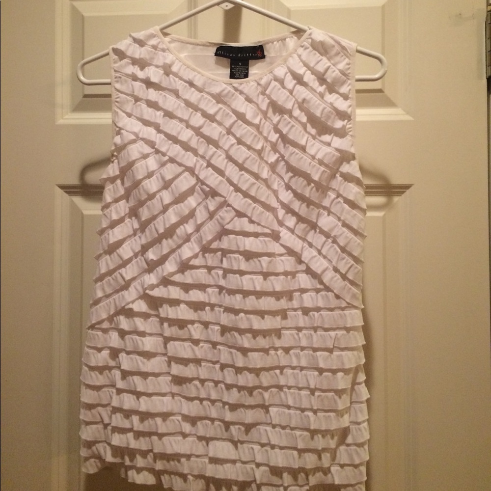 White ruffled top