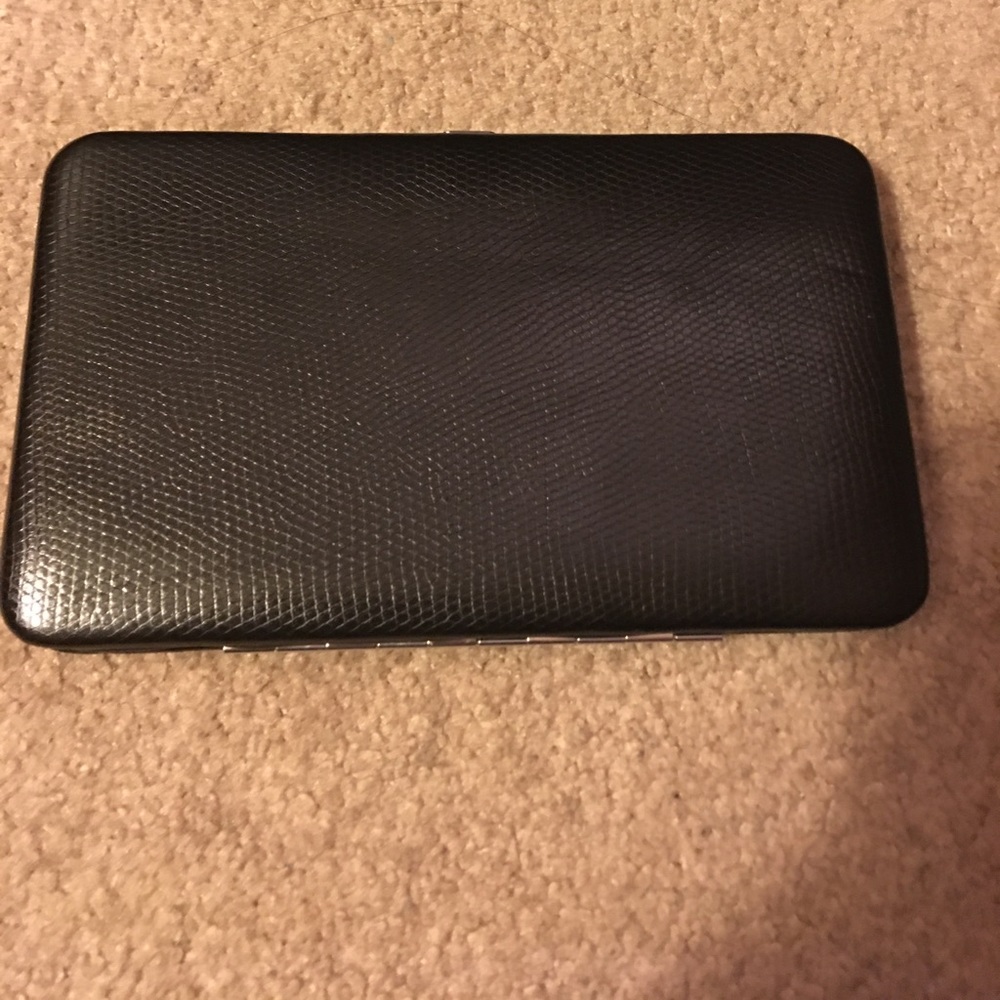 Black clutch wallet ... never used