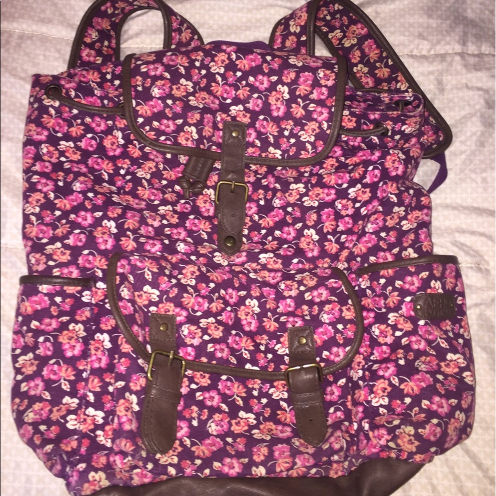 Purple Floral Draw String Back Pack with pockets