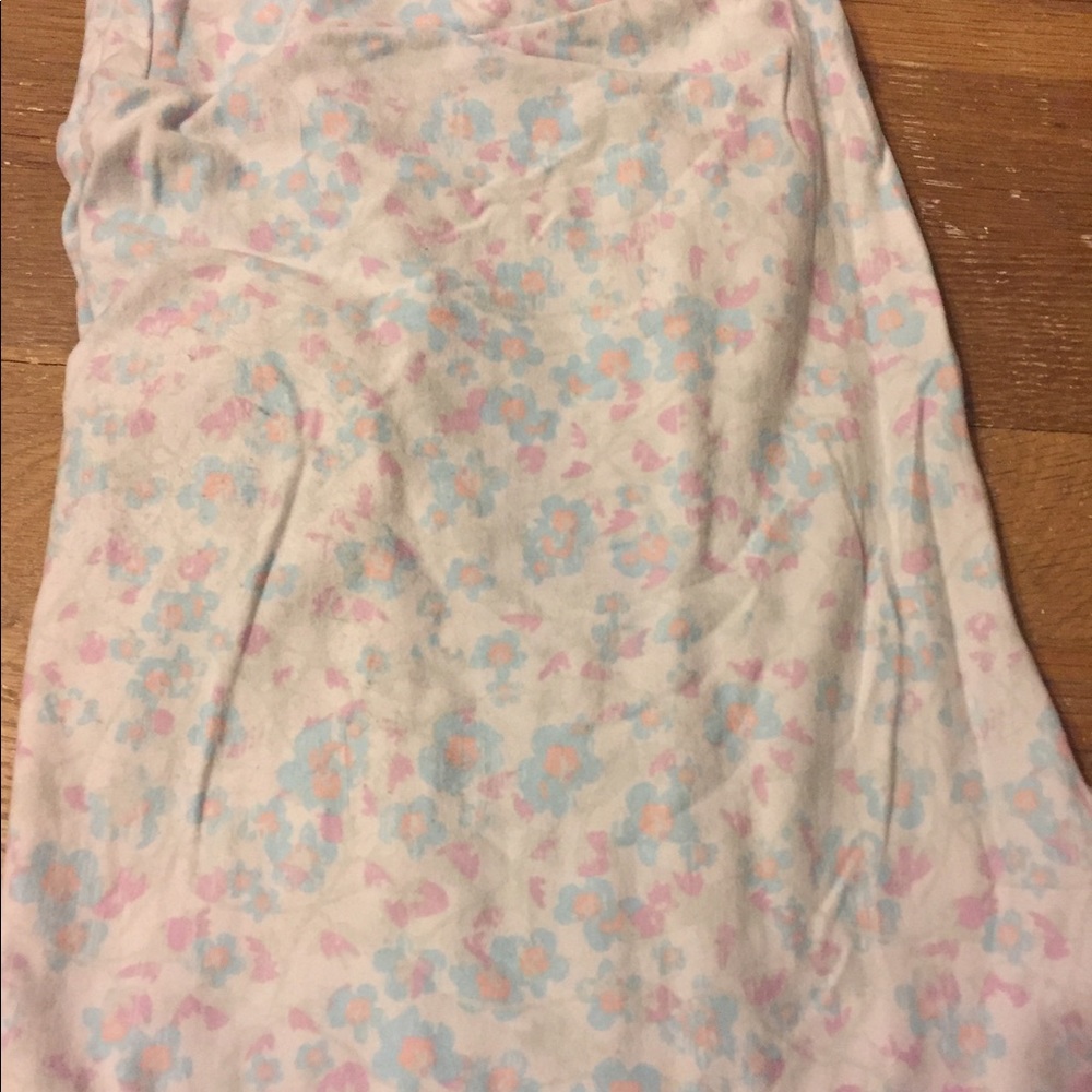 White back round with light pink and blue flowers