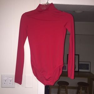 Red turtleneck leotard