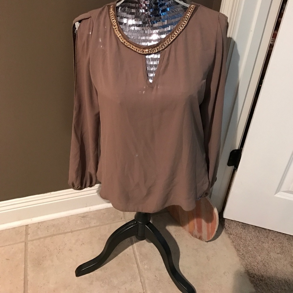Professional style blouse with gold detail
