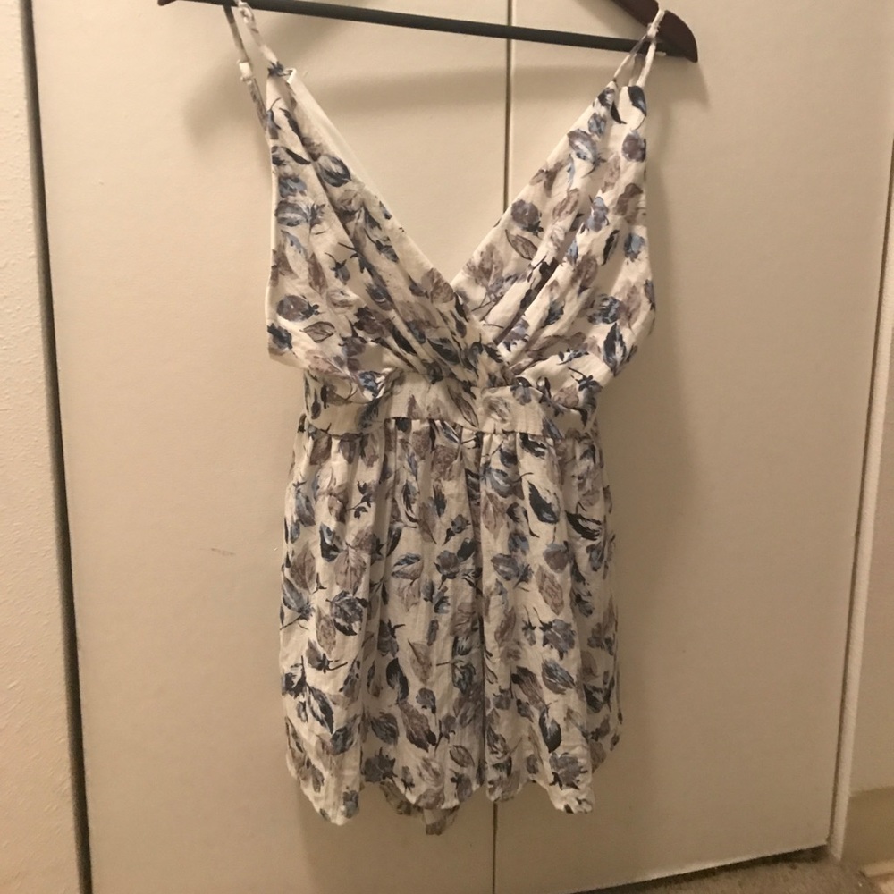 Floral romper with low cut back
