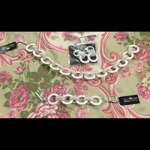 Ear rings, bracelet, and necklace