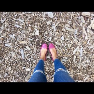 Tory Burch fuschia rubber jelly flats.