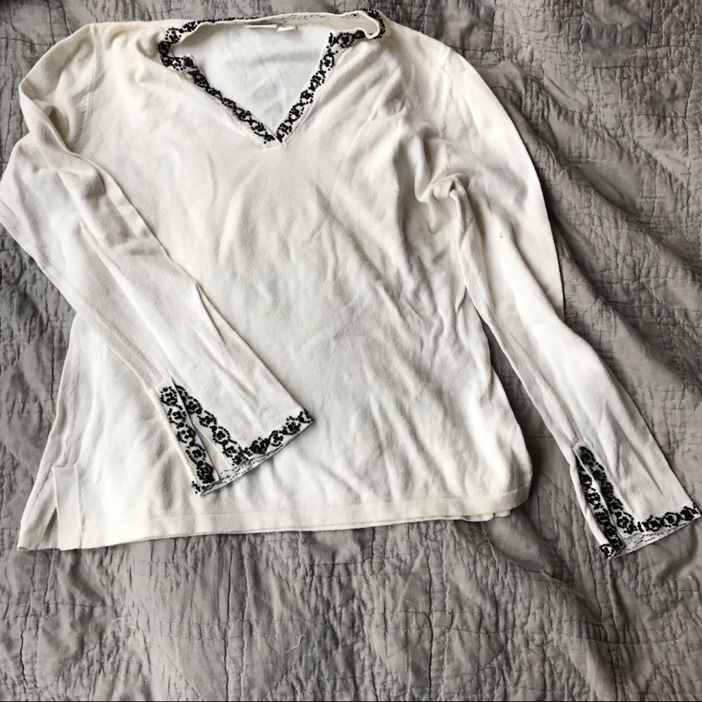 White sweater with black beading