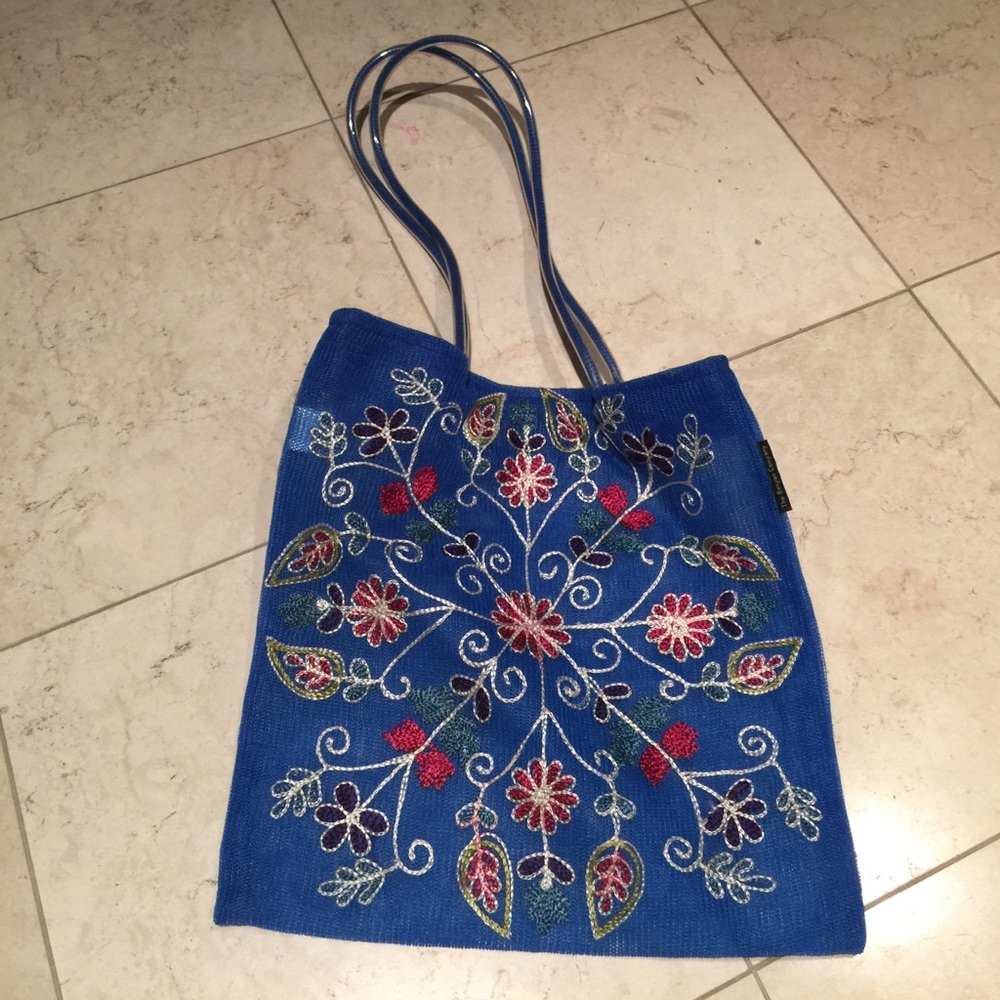 Embroidered mesh hand bag