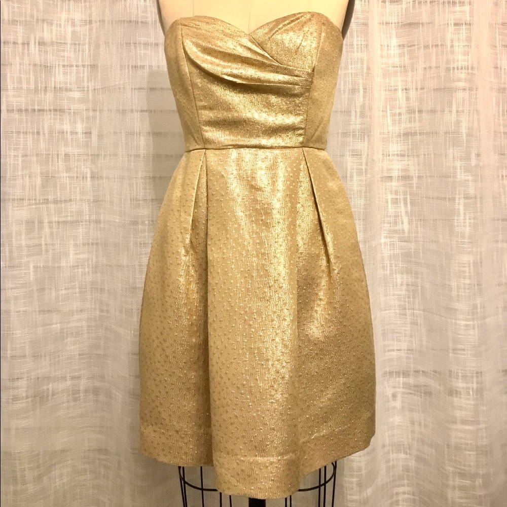 Gold strapless dress by Shoshanna