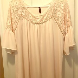 Size large, ivory blouse. Never been worn.