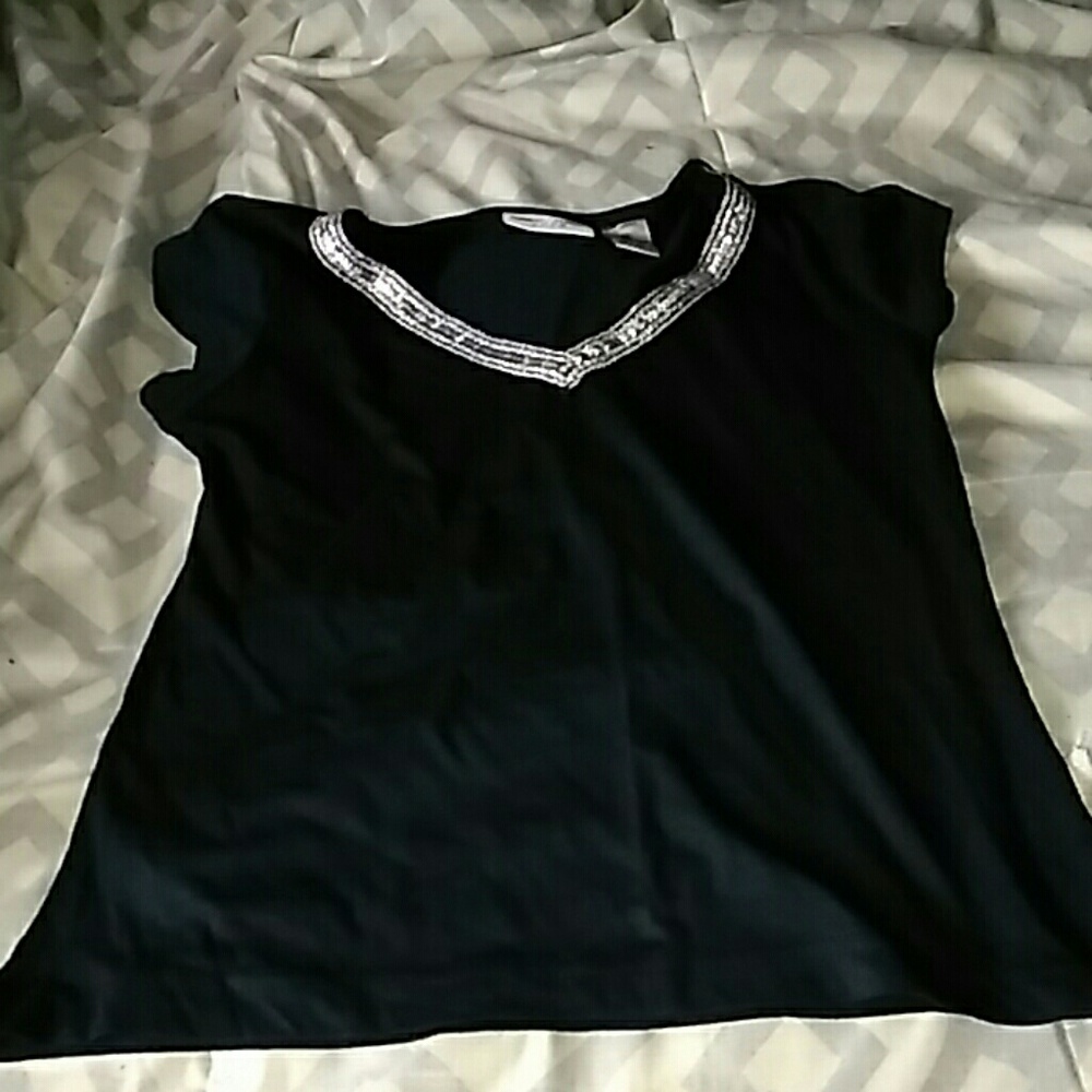 Black shirt with silver  trim around neck