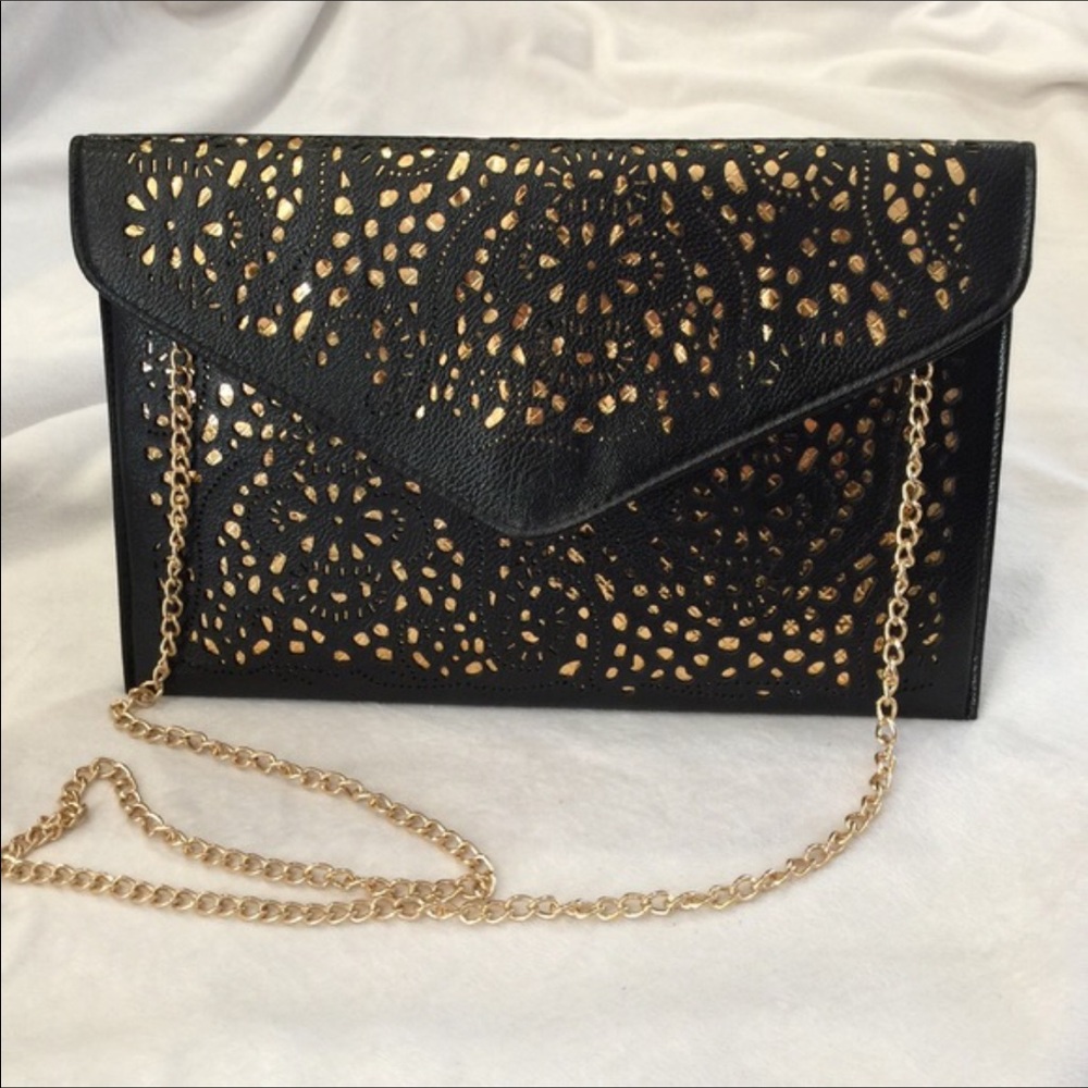 Black faux leather envelope clutch.