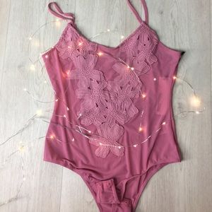 Never worn floral bodysuit