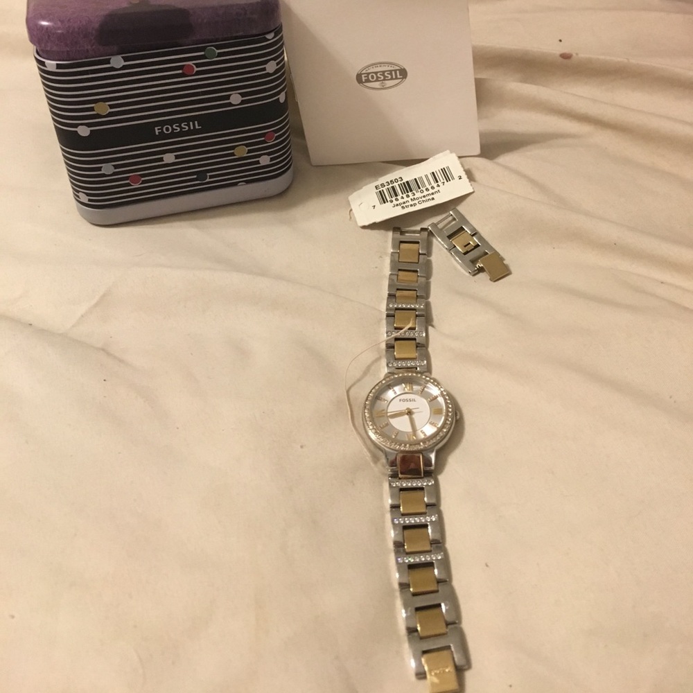 Gold and silver fossil watch