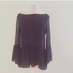 Gorgeous black peplum blouse from Calypso