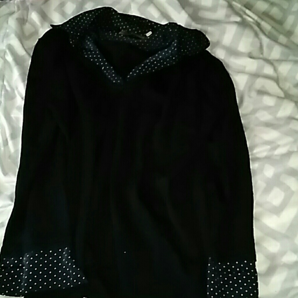 Black shirt with polka dot collar and cuffs