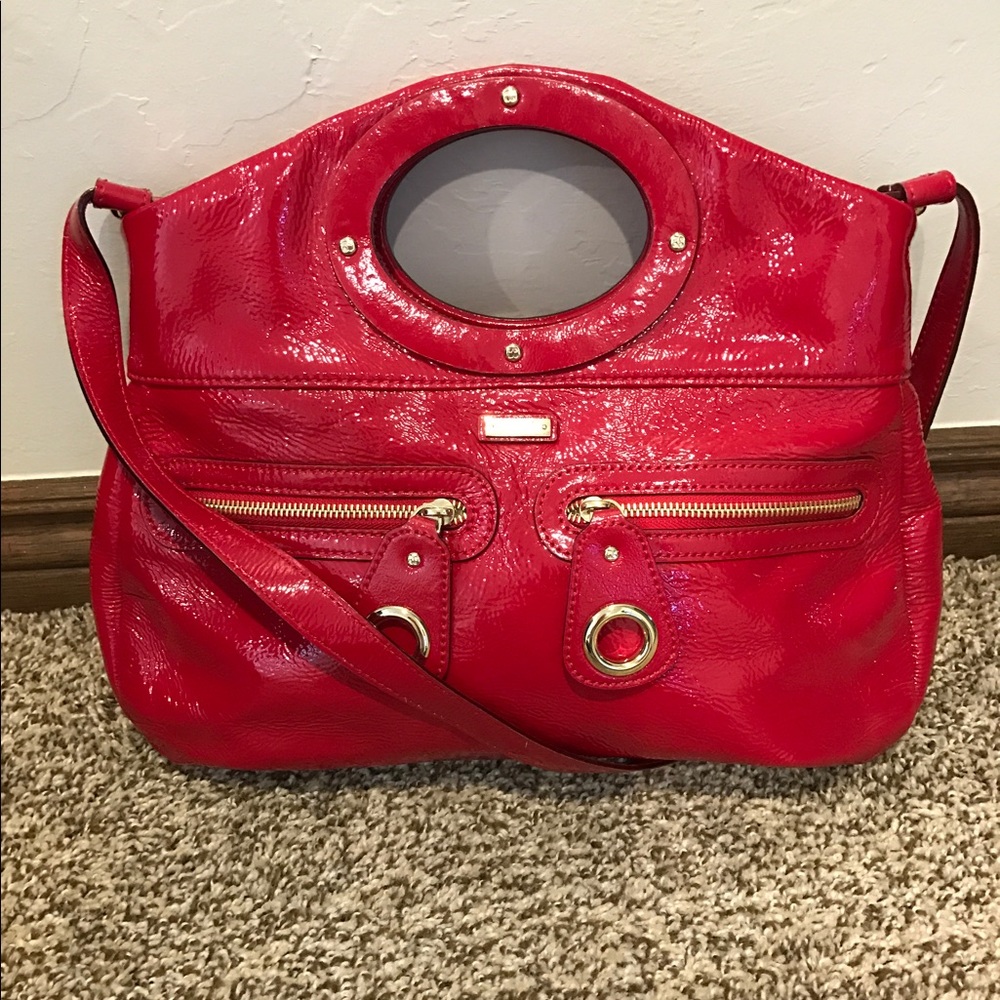 Red patent leather handbag