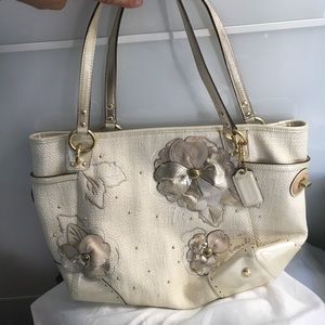 Coach basket weave purse with floral appliqué NWOT