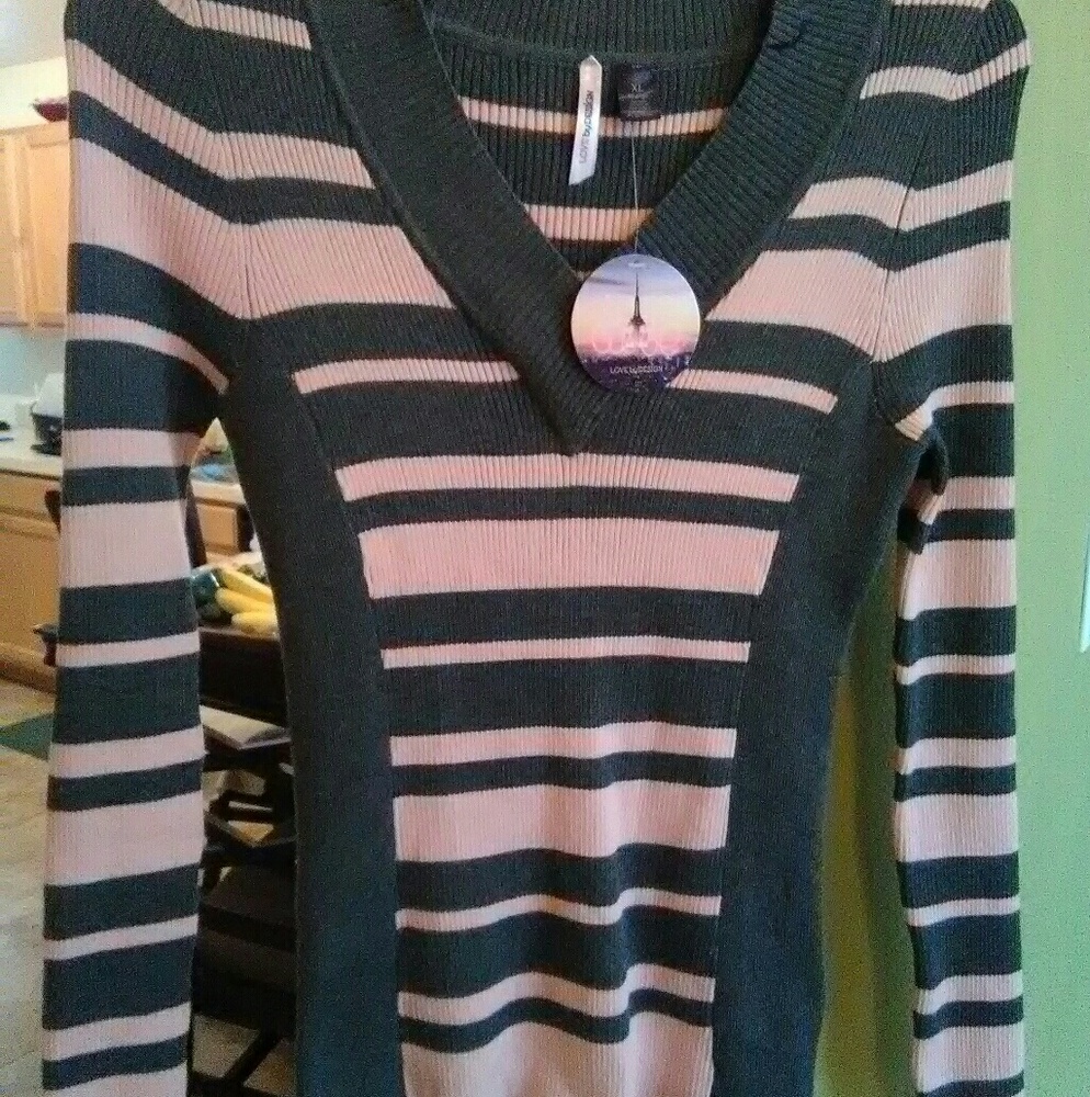 Long sleeve pink and grey stripped sweater.