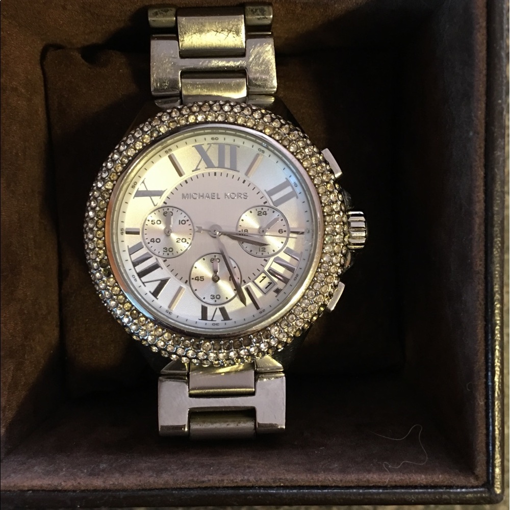 Michael Kors Boyfriend watch with a pink bangle