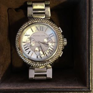 Michael Kors Boyfriend watch with a pink bangle