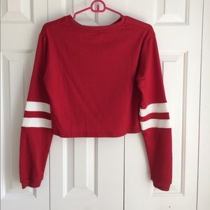 A red crop top shirt