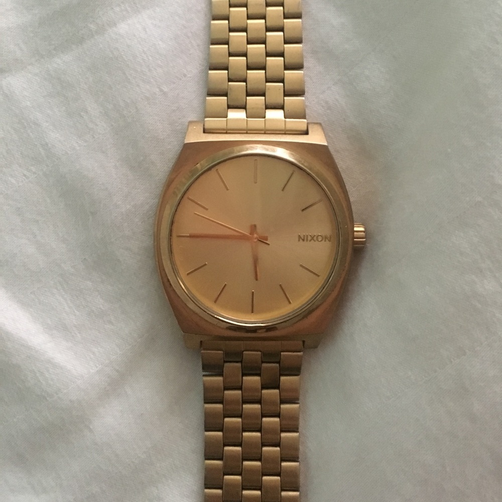 All gold, like new Nixon time teller