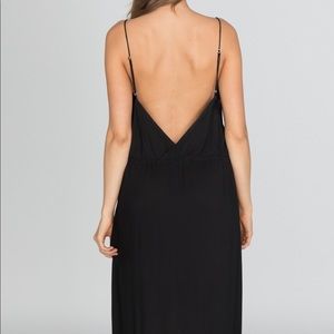 Lush black maxi dress. Low cut top and extra long.