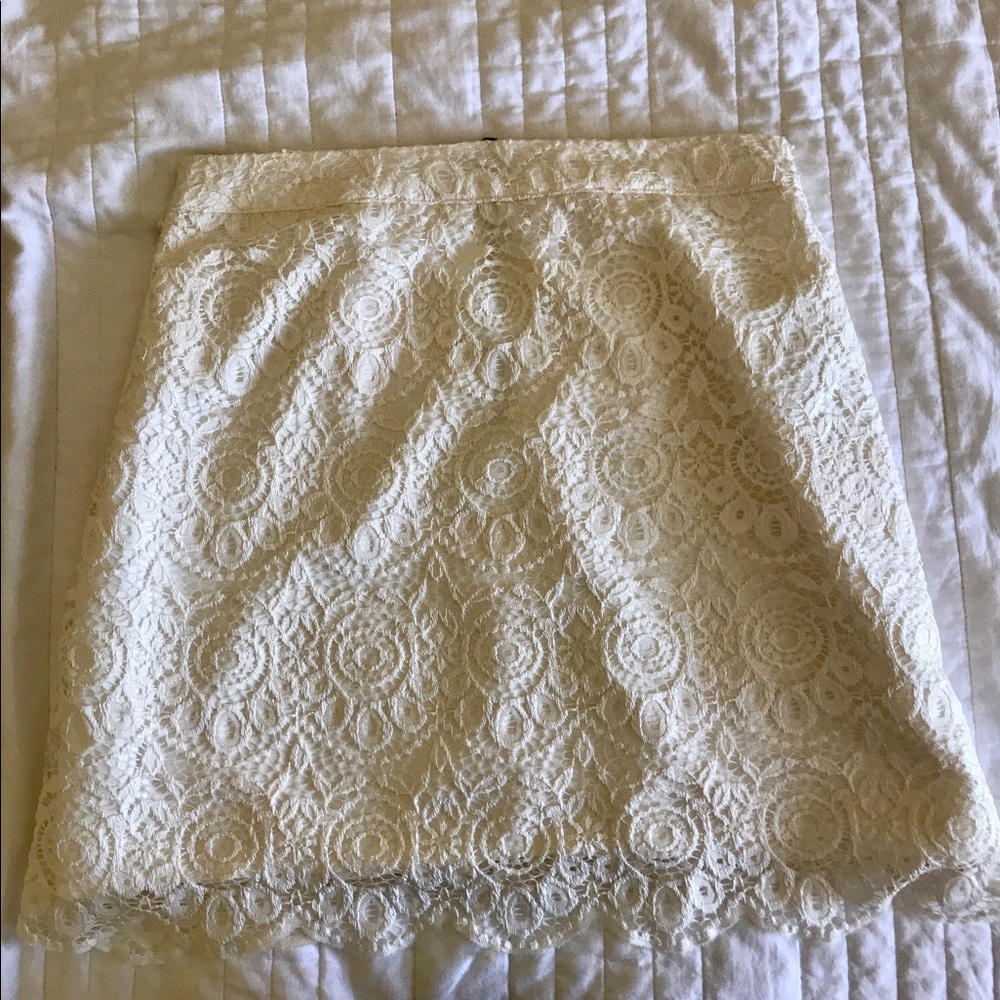 Fitted, white lace skirt