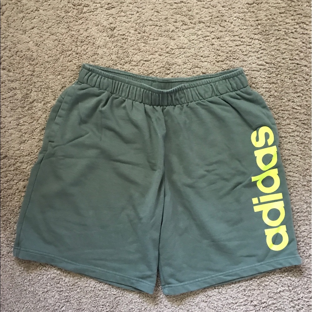 Adidas green sweat shorts with side logo