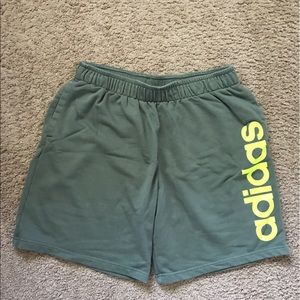 Adidas green sweat shorts with side logo