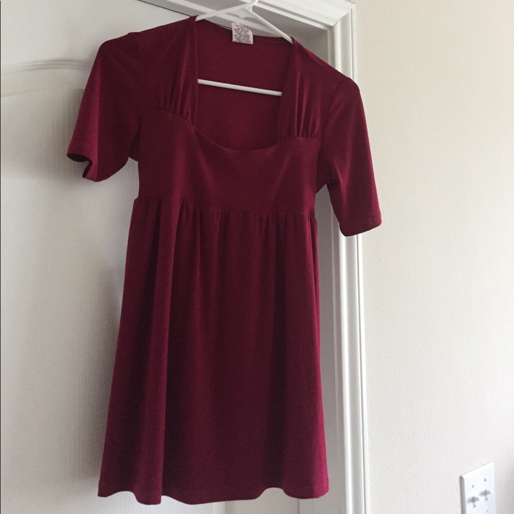 Maurice's maroon top