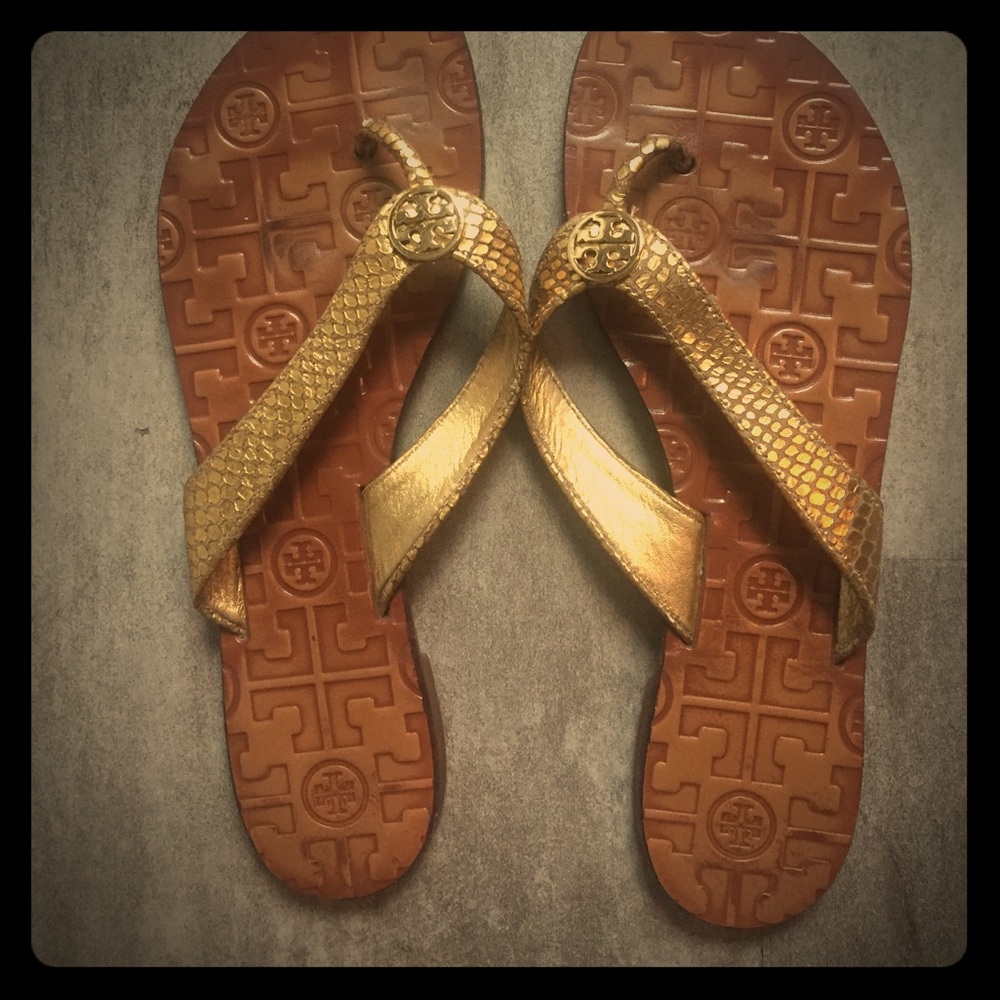 Tory Burch gold flip flops