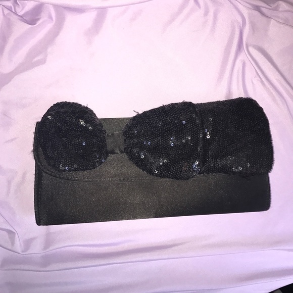 Handbags - Black clutch with sequin bow tie.