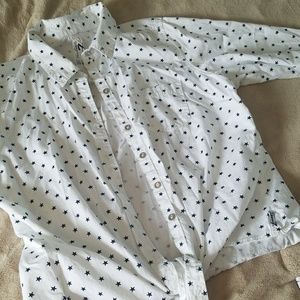 White blouse with blue stars