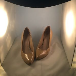 Nude, patent leather Vince Camuto pumps