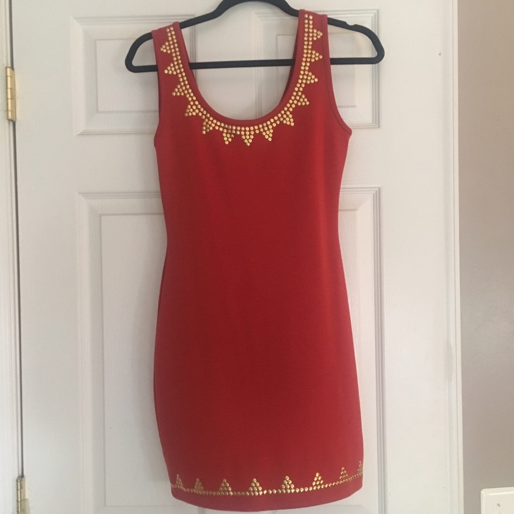Burnt orange bodycon dress.