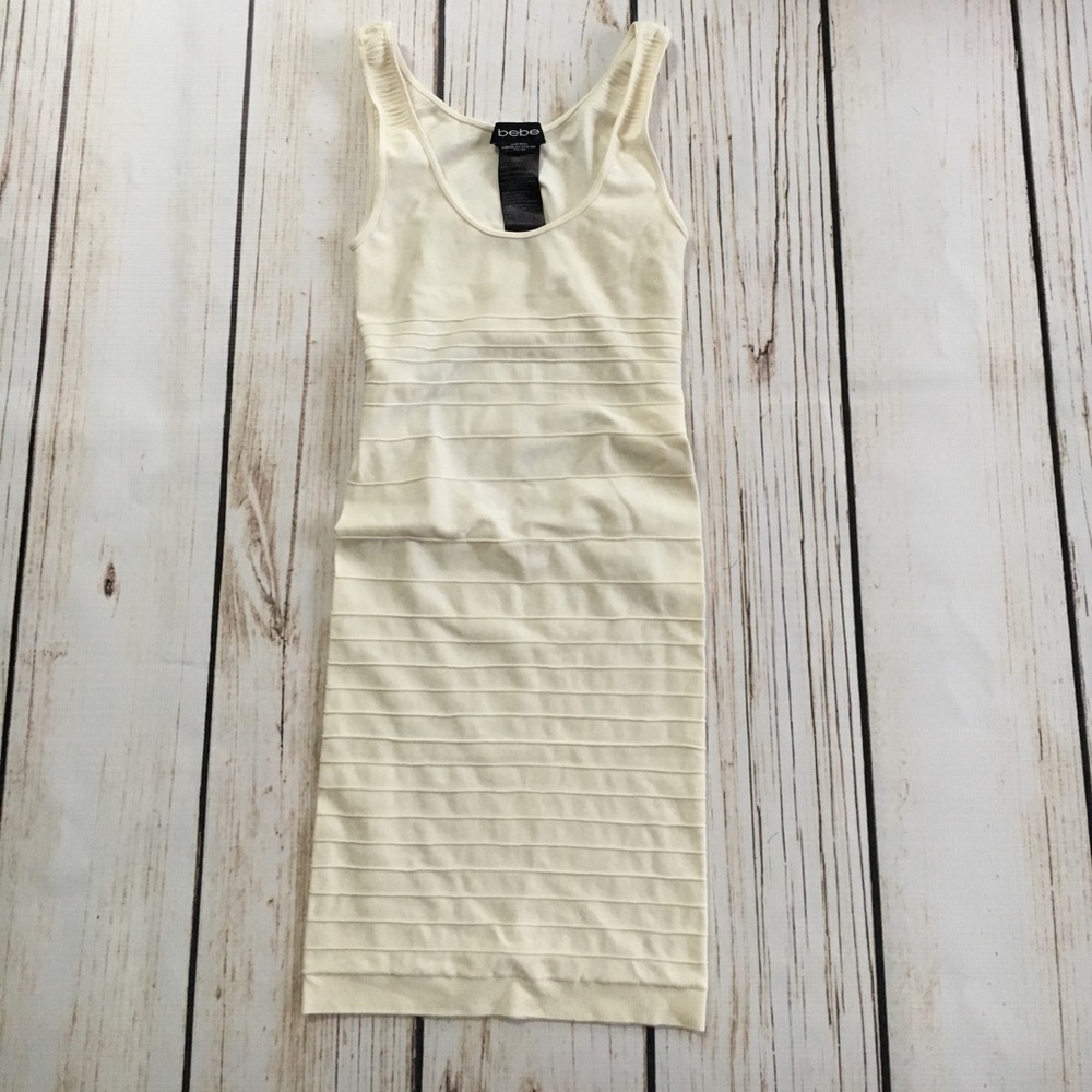Bebe Sz S bodycon dress off white color with shine