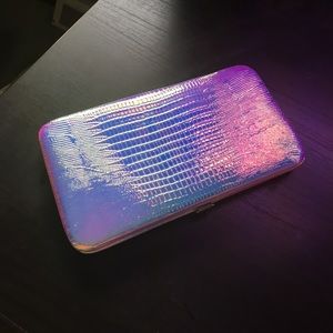 Holographic clutch wallet.