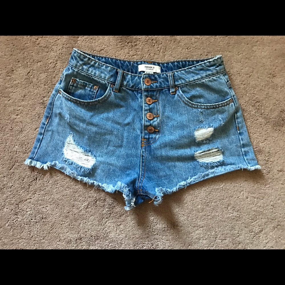 jean shorts with distressed areas