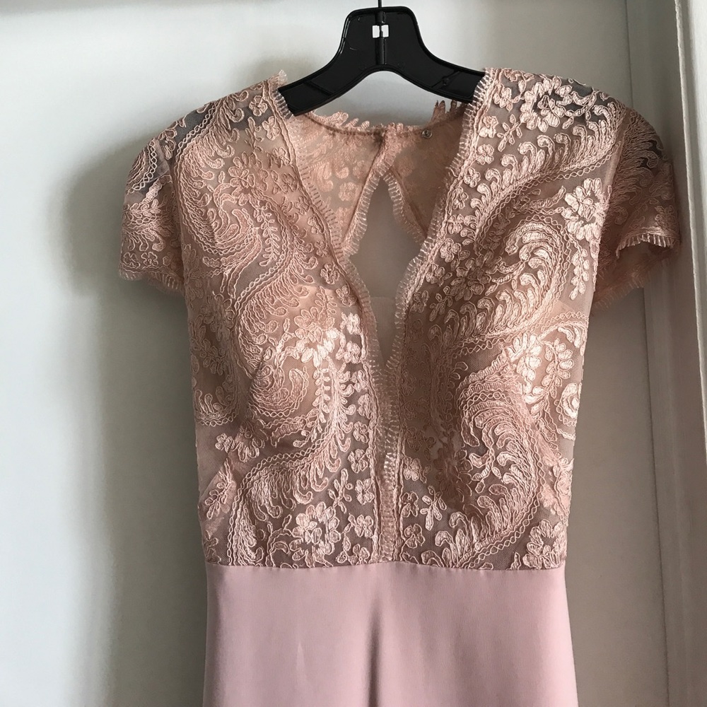 Beautiful formal blush lace and ruched back gown