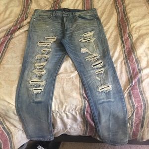 Denim jeans with distressing