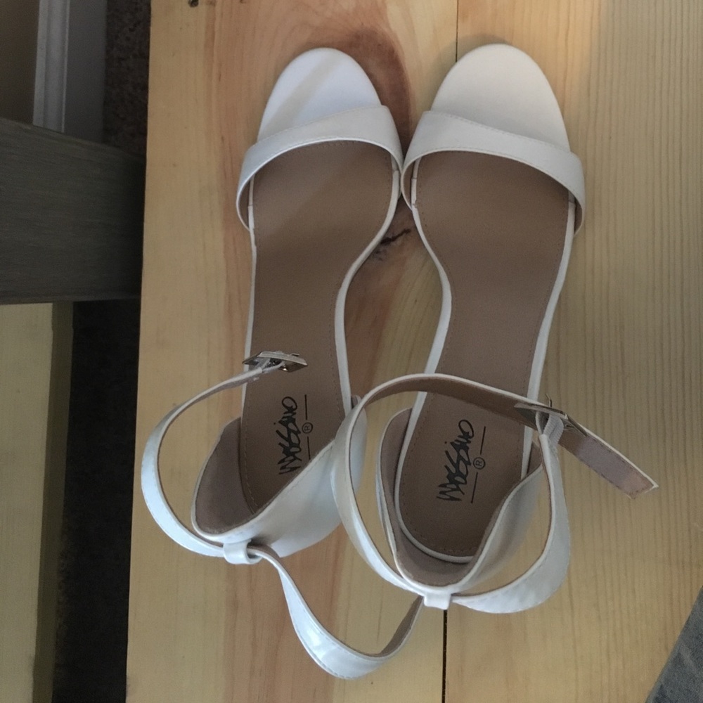 White strap 3-1/2 inches heels from target